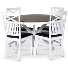 Skagen spisebordssæt; rundt spisebord Ø120 cm - Hvid/brunolieret eg med 4 stk. Fårö stole (Kryds i ryggen) med sort PU-sæde
