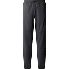 The North Face Herre Bukser & Shorts The North Face Men’s MA Wind Track Trousers Asphalt Grey